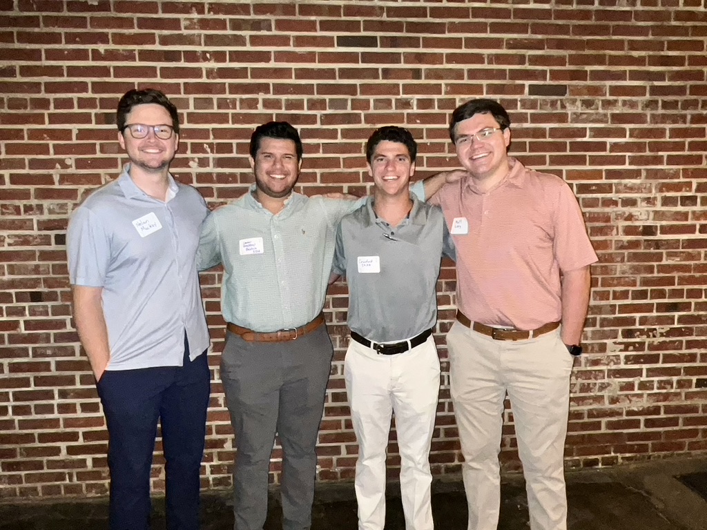 Image of four men at a young professionals networking event in Mobile, AL