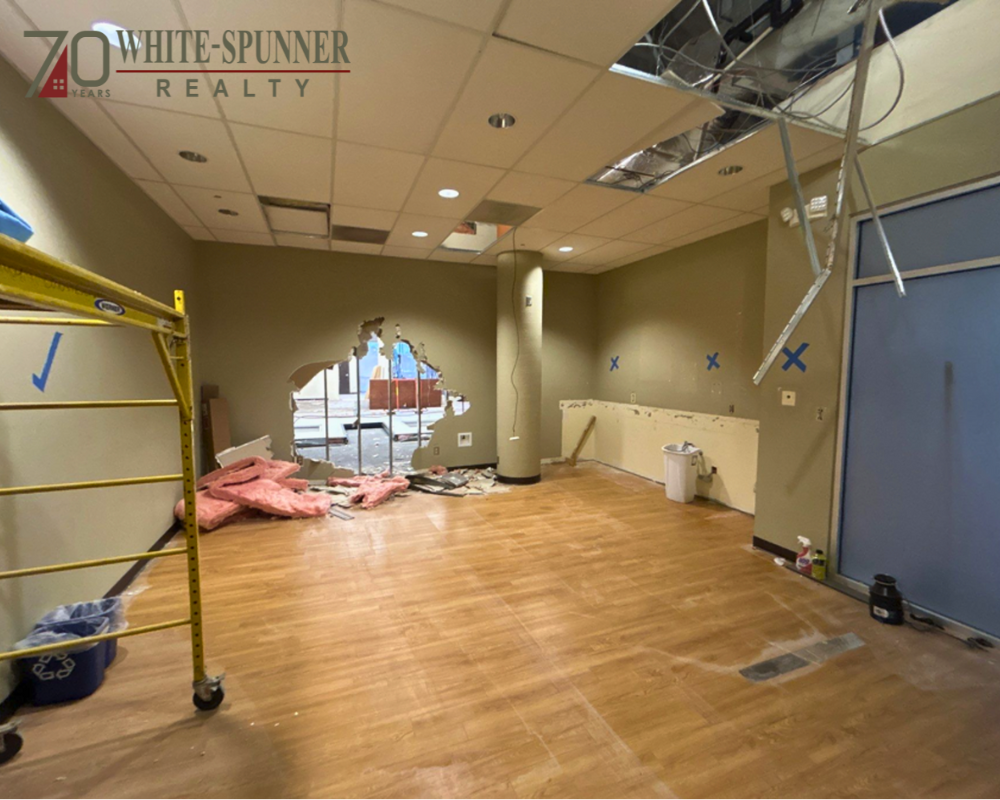 Property manager overseeing strategic renovations to strengthen long-term tenant leases